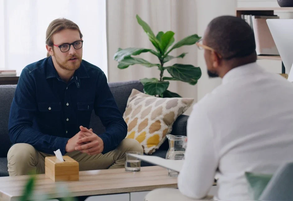 Two men in counselling session